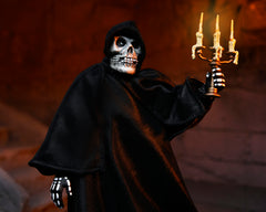 Skeletal figure in cloak holding candelabra in Ultimate Fiend Clothed Action Figure