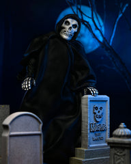 Skeletal figure in black robe behind tombstones for Ultimate Fiend Clothed Action Figure