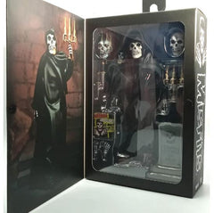 Action figure of the Ultimate Fiend Clothed in a dark robe holding a candle