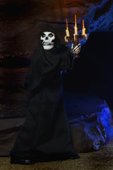 Skeletal Misfits Fiend clothed action figure in black robe holding lit candles