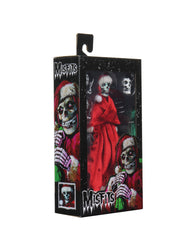 Action figure packaging of Misfits Holiday Fiend with skeleton in red robe and skulls