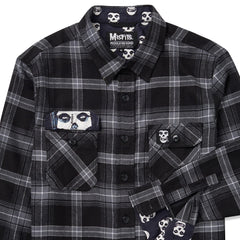 Black long sleeve flannel shirt featuring Misfits-themed skull patches and branding