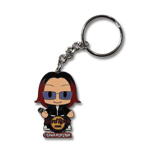 Cartoon keychain charm of a rock star by John Cafiero, perfect for hard rock fans
