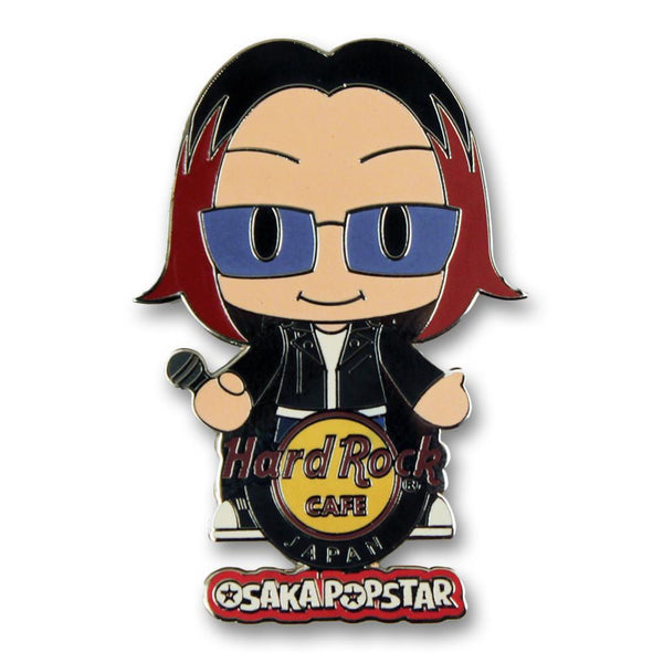 Cartoon pin featuring John Cafiero with sunglasses and Hard Rock Cafe logo