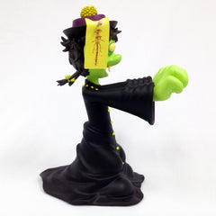 Cartoon witch figurine with green skin from Osaka Popstar Hopping Ghosts vinyl series